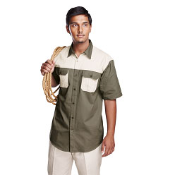 100% cotton twill Bush Shirt in two tone colours; two pleated pockets with flaps; double layer yoke with back box pleat; double needle finishing for strength and durability; ideal for game lodges and industrial applications (Priced from Small) 100% cotton twill Bush Shirt in two tone colours; two pleated pockets with flaps; double layer yoke with back box pleat; double needle finishing for strength and durability; ideal for game lodges and industrial applications (Priced from Small)