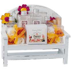 Wellness Gift set on a miniature re-usable wooden bench. Set consists of papaya fragrance shower gel and body lotion(both) 200ml; foam bath (150ml); bath pearls. (100grams); 8 soap blossoms and a brus.... Wellness Gift set on a miniature re-usable wooden bench. Set consists of papaya fragrance shower gel and body lotion(both) 200ml; foam bath (150ml); bath pearls. (100grams); 8 soap blossoms and a brus....