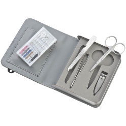 4 Piece stainless steel manicure set with a sewing kit presented in a travel case with a plaque