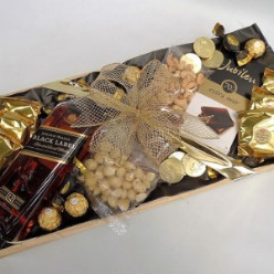 1x 750ml Whisky Johnnie Walker Black Label, 1x 75g Nuts Cashew Salted, 1x 75g Nuts Macadamia Salted, 1x 75g Nuts Almond, 1x 100g Jubileu 70% Dark Chocolate Slab, 6x 1's Coach House Macadamia Nut Shortbread individually wrapped, 6x 1's Kees Beyers Chocolate Coins, 6x 1's Ferrero Rocher Chocolates, 6x 1's Tayas Orient Cappuccino bon bons