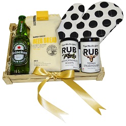 Braai hamper includes braai mitten, beer bread mix, craft beer, 2 x braai rub, all in a wooden box