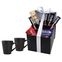 Includes: 2 x Cone Mugs, 1 x Packet of Whispers, 1 x Ferrero Rocher Box, 1 x Lindt Lindor Box and 4 x Cappuccino Sachets