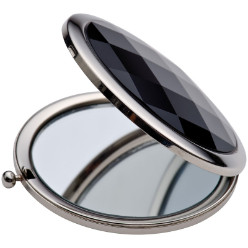 Compact mirror with black finish and a press button. Magnifying and a standard mirror, packed in a black gift box and a velour bag.