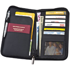 Zip around bonded leather travel wallet with metal plaque and various compartments. Have your travel documents within easy reach