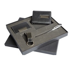 Executive Gift Set consisting of wallet, business card case, keychain with split ring, ballpoint pen with twist action mechanism, all with stainless steel and black PU material with white stitching in gift box