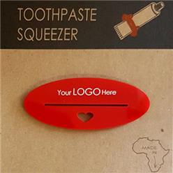 Toothpaste squeezer heart red