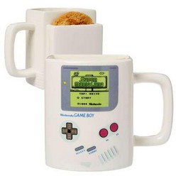 Take a break from gaming and enjoy a cuppa along with a tasty cookie or biscuit with this stylish Game Boy Cookie Mug. The perfect gift for gamers, this ceramic mug features the iconic Game Boy design as well as a nicely placed pocket where you can store your cookie. This really is the perfect accompaniment to your next mid-game tea-break 