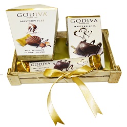 Godiva hamper includes 1 x Godiva box chocolates, 1 x Godiva slab and 1 x small Godiva bar packed in a basket
