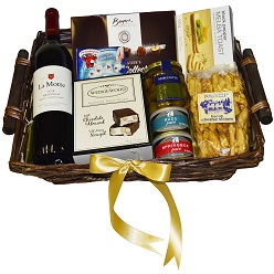 Gourmet hamper includes 1 x bottle red wine, wedgewood nougat, melba toast, 2 x tins pate, beyers box of chocolates, cheese sticks, tin of olives and cheese spread all packed in a basket
