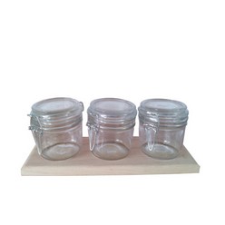 It is a set of hermetic Jars made of glass which can be used different things, according to the needs of the user. It comes as a set of 3 similar jars on a wooden tray. Each jar has a capacity of 200 ml in total and as such is very good for use in the kitchen or pretty much any other department that needs storage. It is pretty standard in build and has little to no customizations.
