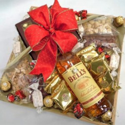 1x 750ml Whisky Bells, 7x 1's Coach House Macadamia Nut Shortbread individually wrapped, 1x 160g Jubileu Praline Milk Choc Gold Box, 9x 1's Ferrero Rocher, 8x 1's Sally Williams Nougat, 1x 75g Nuts & Berries, 1x 75g Nuts Cashew Salted, 1x 75g Nuts Macadamia Salted, 1x 75g Nuts Almond