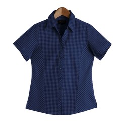Ladies Pioneer Check Blouse: Feminine features include slimline placket, shaped side panels and side slits. Corporate design using yarn dyed pattern to complement subtle embroidery. Available in four colourways. 100% Cotton, medium weight fabric