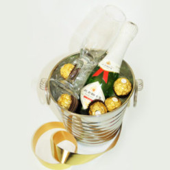 1x Mini Ice Bucket, 1x Glasses Champagne Glass, 1x 750ml Champagne Robertson Non Alcoholic, 5x 1's Ferrero Rocher Chocolates