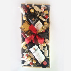 1x 750ml Wine - Nederburg Merlot, 1x 750ml Wine - Nederburg Baronne, 4x 1's Coach House Macadamia Nut Shortbread individually wrapped, 1x 30g Raffaellos 3's, 8x1's Sally Williams Nougat, 8x 1's Ferrero Rocher Chocolates, 3x 1's Lindt Lindor Dark Chocolate Truffles, 3x 1's Lindt Lindor Milk Chocolate Truffles