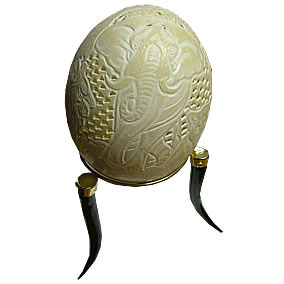 Ostrich egg shells have become popular because they can be used in many different ways. Empty egg shells are best for artwork and engraving. They can be used to make beautiful lampshades as well. Giftwrap offers a hand carved ostrich egg shell and lampshade. The technique used to carve ostrich eggshell is similar to use for carving a pumpkin. Since the ostrich egg shell is delicate the carvings are very tricky. 