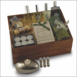Re-useable wooden box, stoneshape tealight holder, 6 tealights, 3 fragrances, pashmina, handcream, handwash and room spray, tissue oil, bath salts, soap, ferrero rocher chocolates