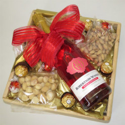 1x 750ml Champagne Robertson Non-Alcoholic, 1x 75g Nuts pistachio, 1x 75g Nuts Cashew Salted, 1x 75g Nuts Mixed, 1x 75g Nuts Macadamia SaIted, 4x 1's Ferrero Rocher, 4x 1's Lind Lindor Milk Chocolate Truffles