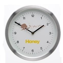 Aliminium wall clock with a single rim around the clock, it has small lines in between the numbers to keep time and a big white face
