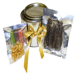 Small tin hamper 2 includes 30g nuts, 30g sugar coated fruit and 30g biltong packed in a small tin