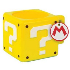 Grab a quick power up boost and keep on with your own adventures with this Super Mario inspired Question Block Mug. A shaped ceramic mug with embossed question mark icon from the classic 3D Super Mario games, this is just the thing to stay alert and focused when playing the latest hit Mario game. Perfect for home or the work place, the Question Block Mug is a nod to a true icon of gaming, and with its distinctive shape and design is a great gift for gamers or fans of the famous moustachioed hero....