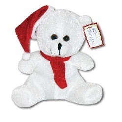 Teddy bear that is white and wearing a Christmas hat and a Christmas scarf.